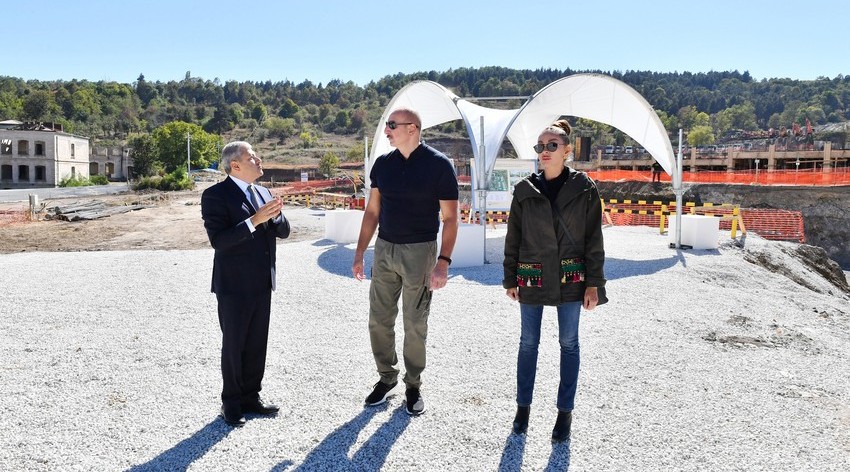 President Ilham Aliyev and First Lady Mehriban Aliyeva view construction progress at new residential complex in Shusha