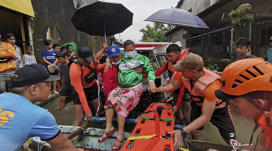 Philippine capital braces for storm Nalgae, death toll cut to 45