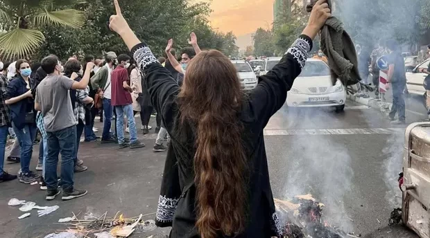 Iranian forces shooting at faces and genitals of female protesters, medics say