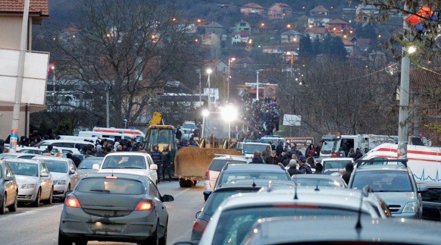 Kosovo police exchange fire with local Serbs blocking roads