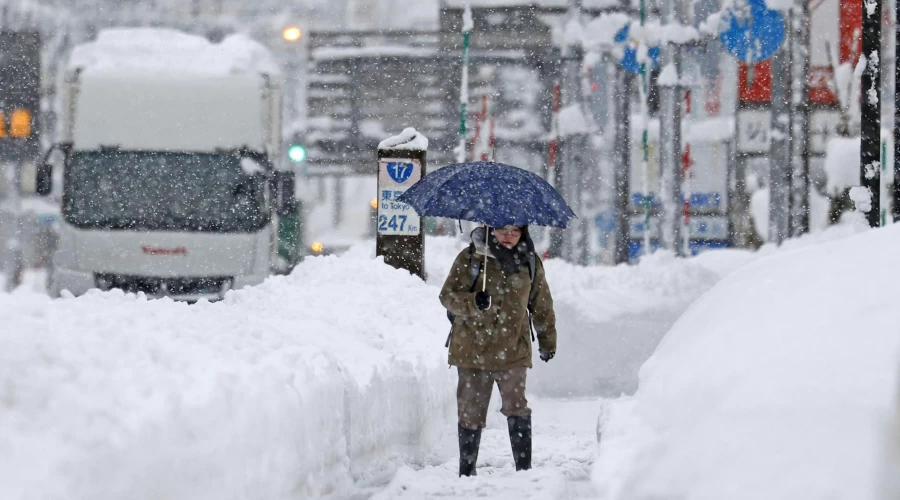 Japan's recent heavy snow has caused 13 deaths, many injuries