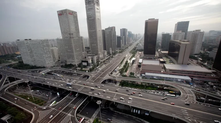 China’s workers return to office as cities live with COVID