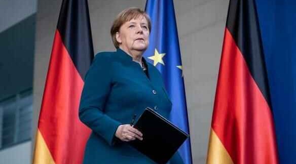 Merkel says color of her clothes conveys political signals