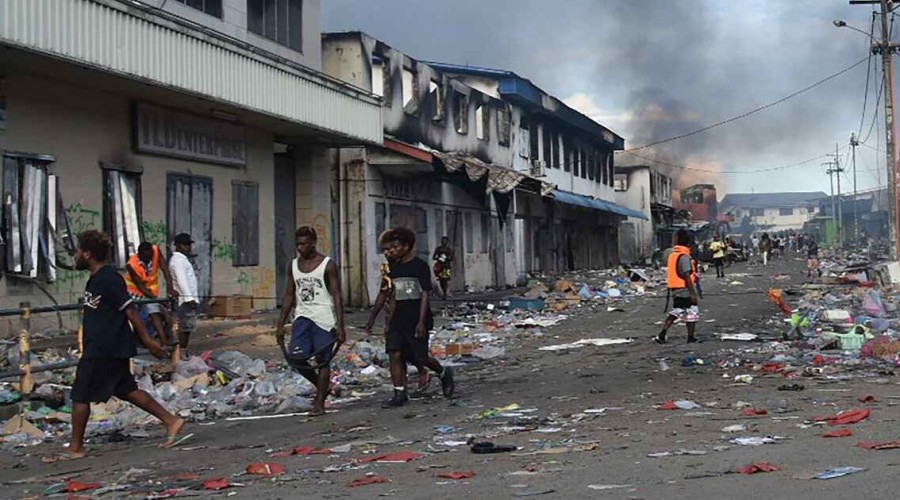 Over 100 people arrested in Solomon Islands after riots in Honiara