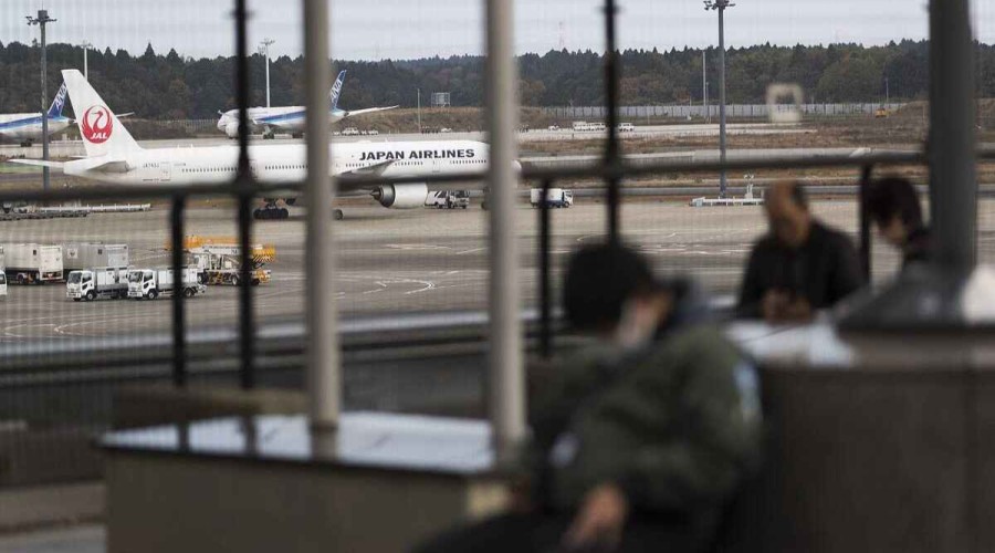 Japan suspends reservations on incoming flights to halt spread of Covid variant