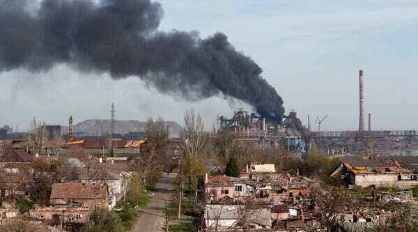 More Ukrainian evacuees leave ruined Mariupol as EU targets Russian oil, banks