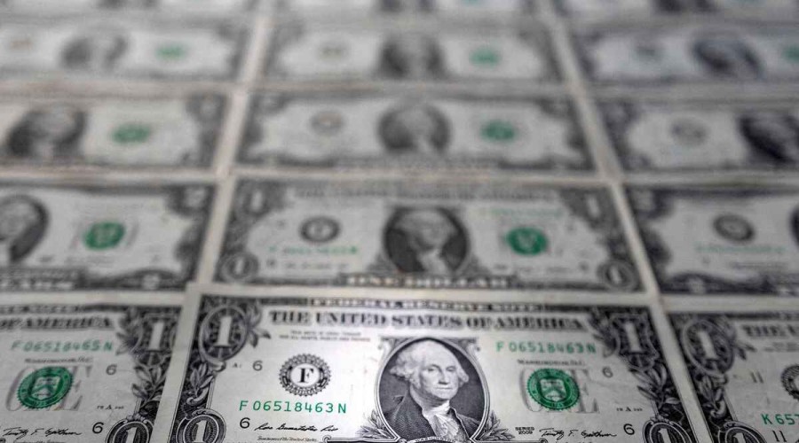 Dollar climbs further pinning euro, yen at multi-decade lows