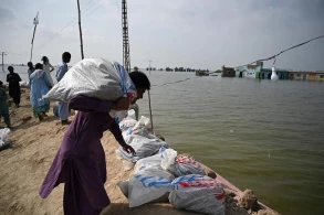 Pakistan races to keep floodwaters out of power station
