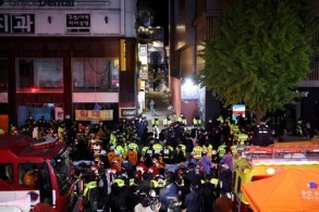 South Korea in mourning after crowd surge kills 153