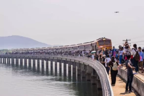 Thailand's 'floating train' a big hit as dam waters rise