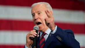 Biden warns on risk to democracy, Trump hints at another run on eve of midterms