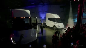 Musk delivers first Tesla truck, but no update on output, pricing