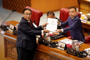 Indonesia parliament ratifies criminal code that bans sex outside marriage