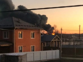 A drone attack set an oil storage tank on fire at an airfield in Kursk