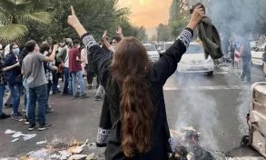 Iranian forces shooting at faces and genitals of female protesters, medics say
