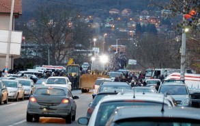 Kosovo police exchange fire with local Serbs blocking roads