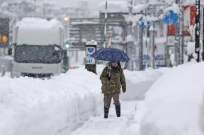Japan's recent heavy snow has caused 13 deaths, many injuries