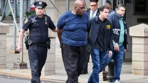 Gunman who smoke bombed subway pleads guilty to terrorism