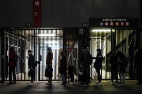 Students in France queue for food aid amid pandemic