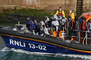 Record 853 migrants cross English Channel in small boats in single day