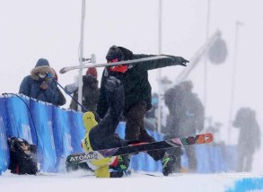 Beijing 2022: Cameraman knocked off his feet by freefalling freeskier