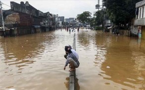 Floods in South Africa leave at least 20 dead