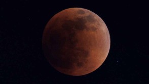 Full lunar eclipse creates rare super blood Moon