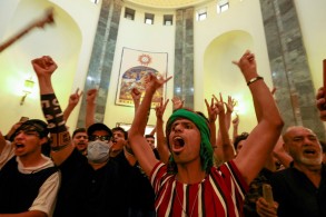 Clashes kill 10 as Iraq's Sadr quits politics